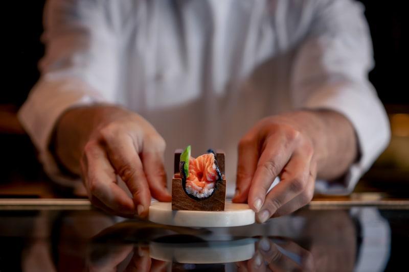 A lively Japanese-inspired restaurant featuring classic temaki-style hand rolls
with a selection of unique sakes.  